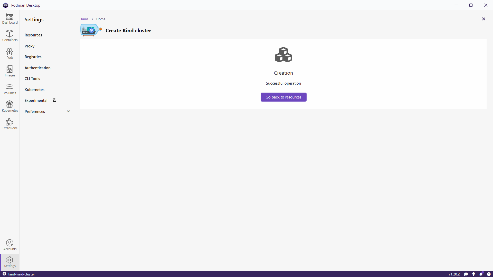Screenshot of Podman Desktop with the success message after create a kind cluster.